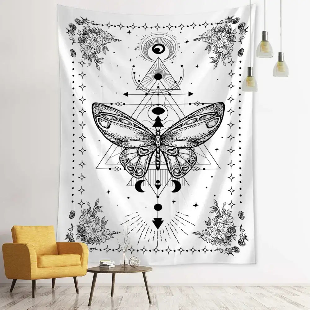 White wall hanging tapestry featuring a black ink geometric butterfly surrounded by mystical symbols and floral decorbites geometric butterfly design
