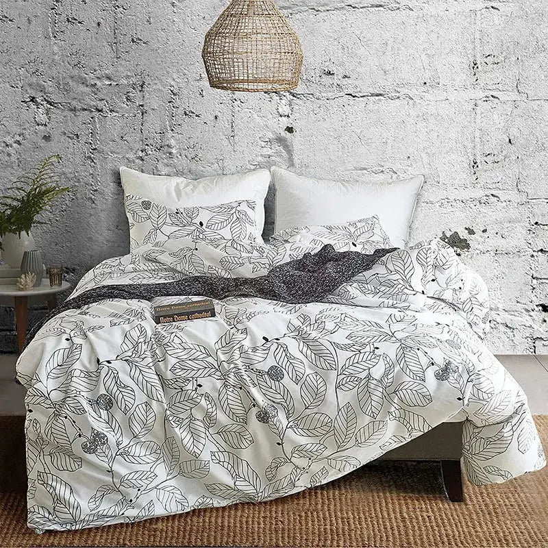 White duvet cover with black leaf and berry illustrations from decorbites boho chic stripe microfiber bedding set