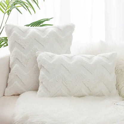 White fluffy boho chic pillow cover with textured faux fur chevron pattern for bedroom decor by decorbites