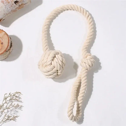 Cream-colored decorbites handwoven cotton curtain tieback with knotted ball and loop handle for living room decor