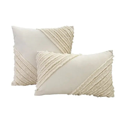 Cream-colored rectangular cushion cover with lace floral texture and fringed fabric accents from decorbites boho white collection