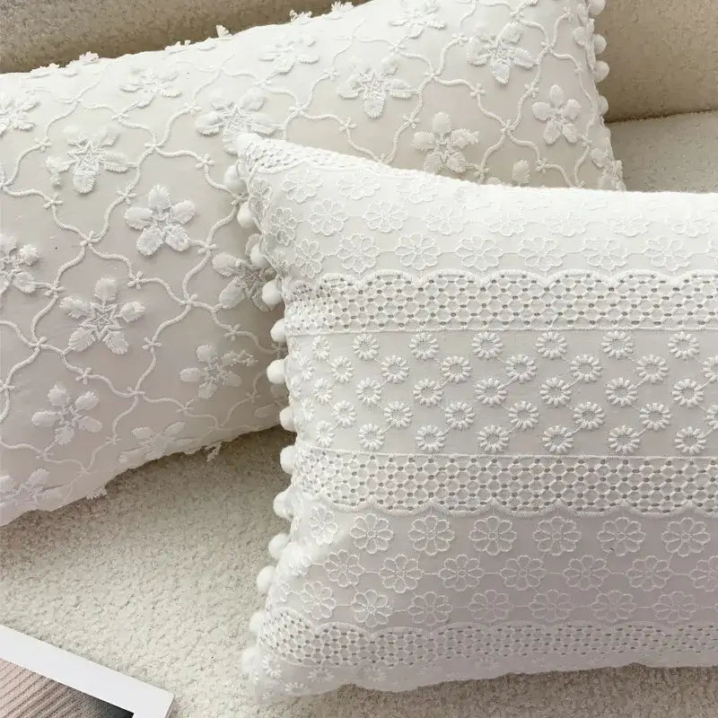 Boho cream lace floral cushion cover featuring white embroidered lace and pom pom trim for living room decorbites boho white