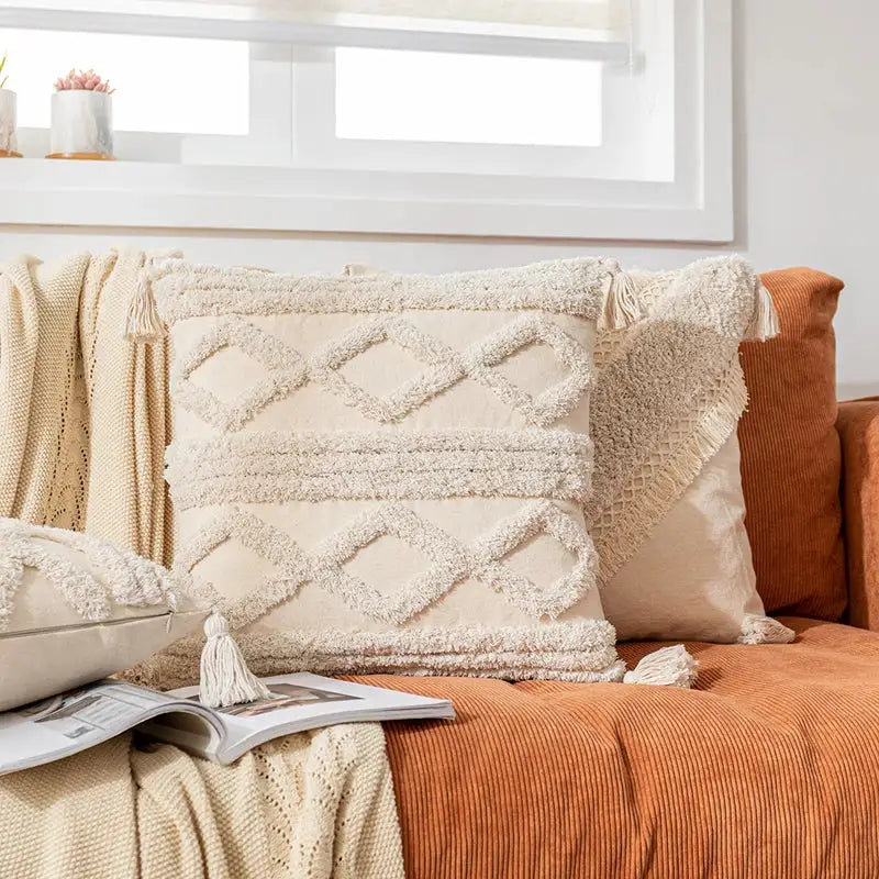 Cream-colored boho cotton tassel pillow cover with textured diamond embroidery ideal for living room decorbites decor
