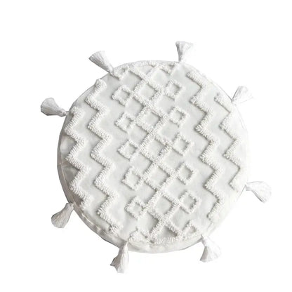 Boho cream textured round lumbar pillow cover set with white zigzag pattern and tassels for bedroom decor