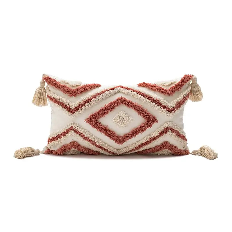 Cream-colored boho diamond pillow with rust-red geometric embroidery and beige tassels cushion covers by decorbites
