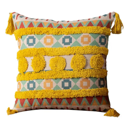 Vibrant geometric boho fringe pillow covers with bold yellow tassels and textured pom-poms for living room decorbites decor