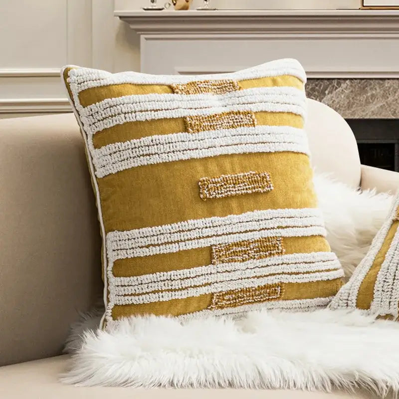 Mustard-yellow boho loop tufted cushion cover with white textured stripes and embroidered accents for living room decorbites decor
