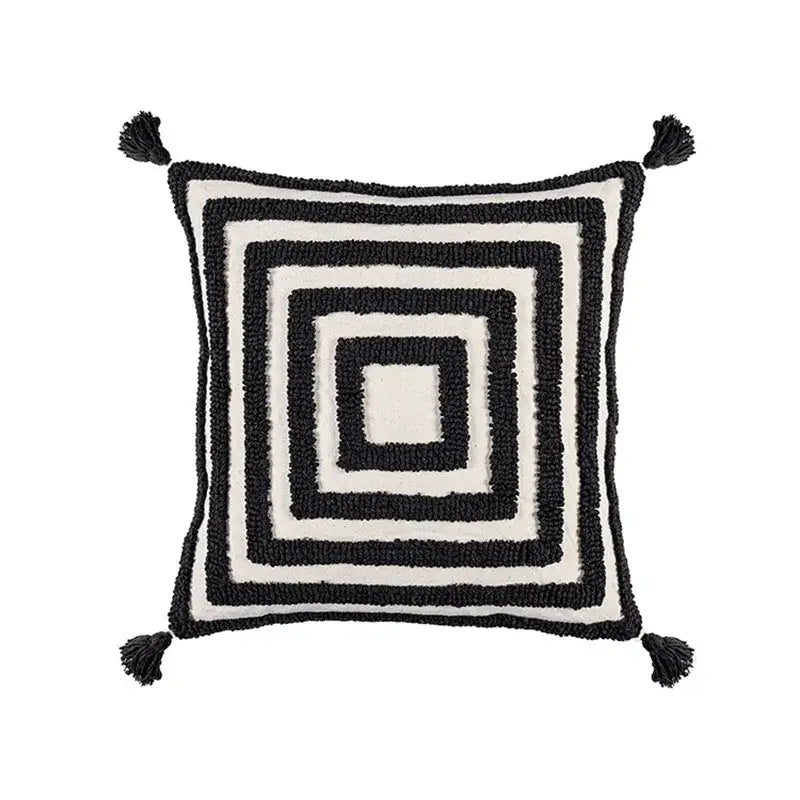 Black and white textured cushion cover with boho geometric tufted pattern and tassels for living room decorbites decor