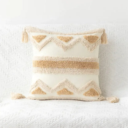Cream-colored boho geometric tufted cushion cover with textured beige patterns and tassels for living room decorbites decor