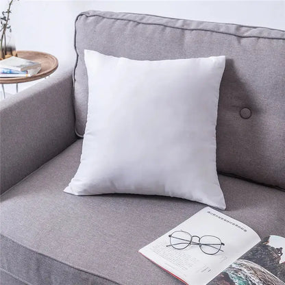 White square cushion cover with soft plush fabric and decorbites geometric tufted embroidery on gray sofa decor
