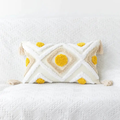 Cream-colored cushion cover with yellow beige geometric tufted embroidery and tassels for boho living room decorbites decor