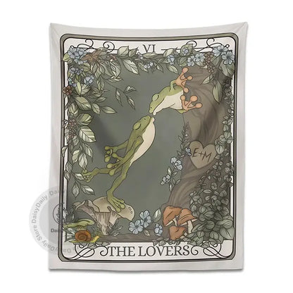 A soft gray lover tarot tapestry wall hanging featuring two green frogs kissing with foliage and mushrooms decorbites frog lover