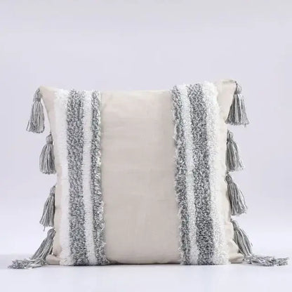 Cream-colored cushion cover with gray and white woven stripes and tassels for boho morocco tufted decorbites boho morocco