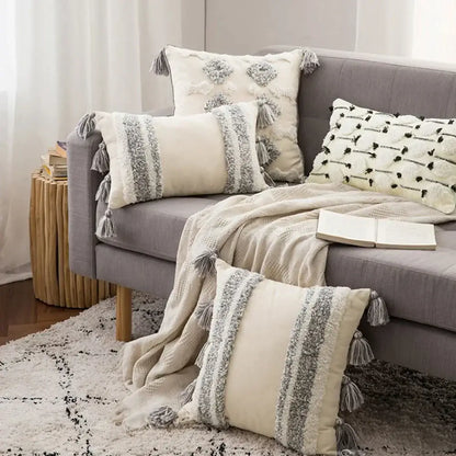 Cream-colored cushion cover with gray textured stripes and tassels for decorbites boho morocco tufted decor