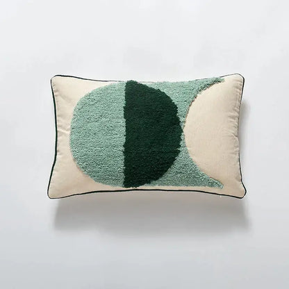 Cream-colored rectangular cushion cover with green split circle design for boho green and cream geometric decorbites blue tufted decor