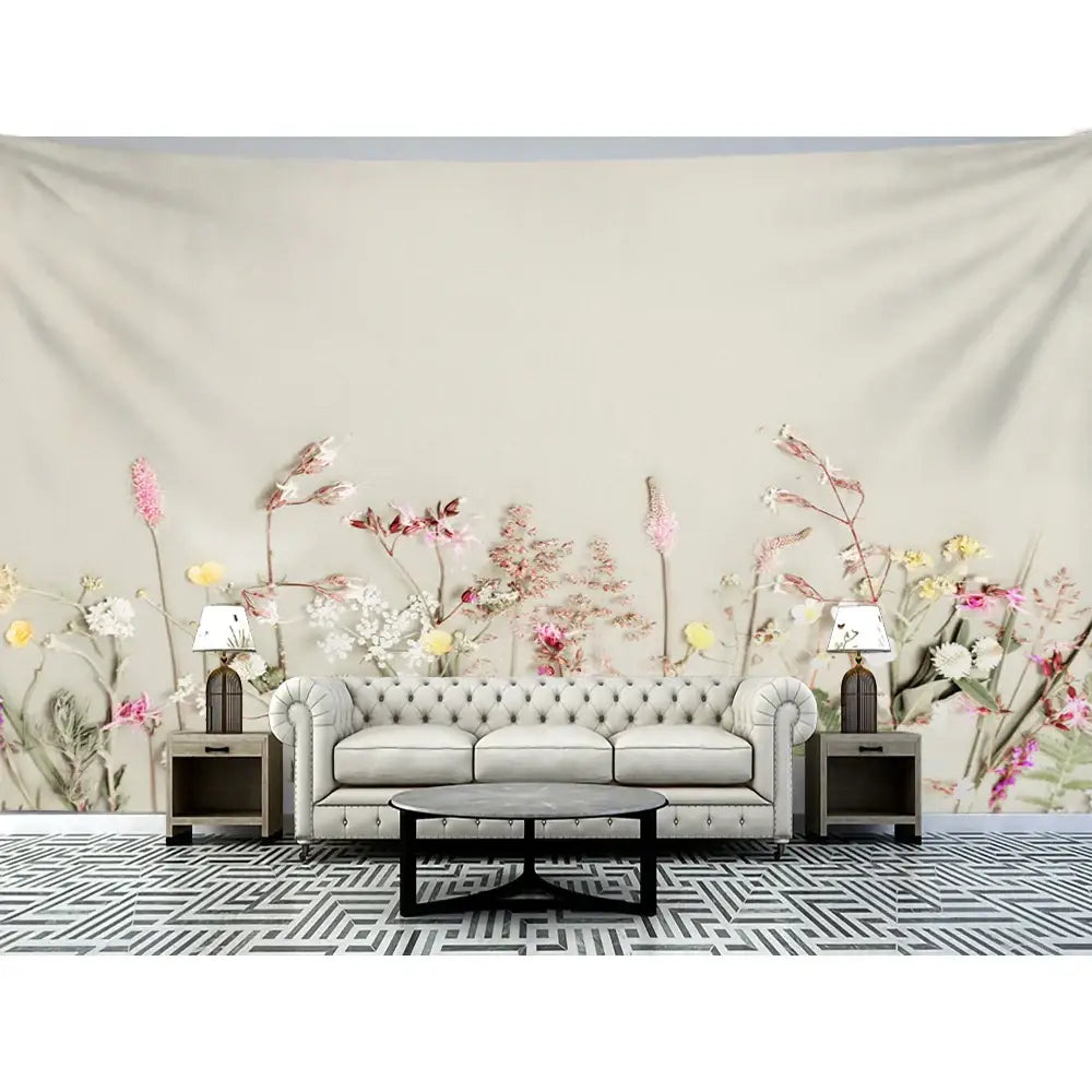 Beige tufted leather sofa with rolled arms and button detailing complementing decorbites boho green leaf tapestry wall hanging