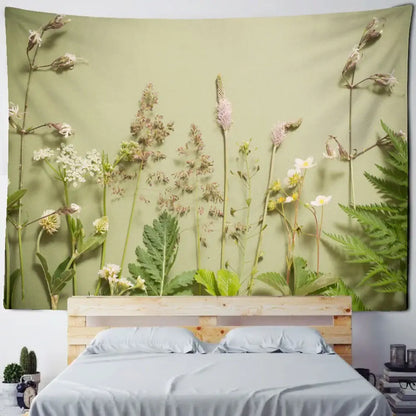 A soft olive green boho green leaf wall tapestry featuring detailed botanical wildflowers and fern decorbites boho green leaf