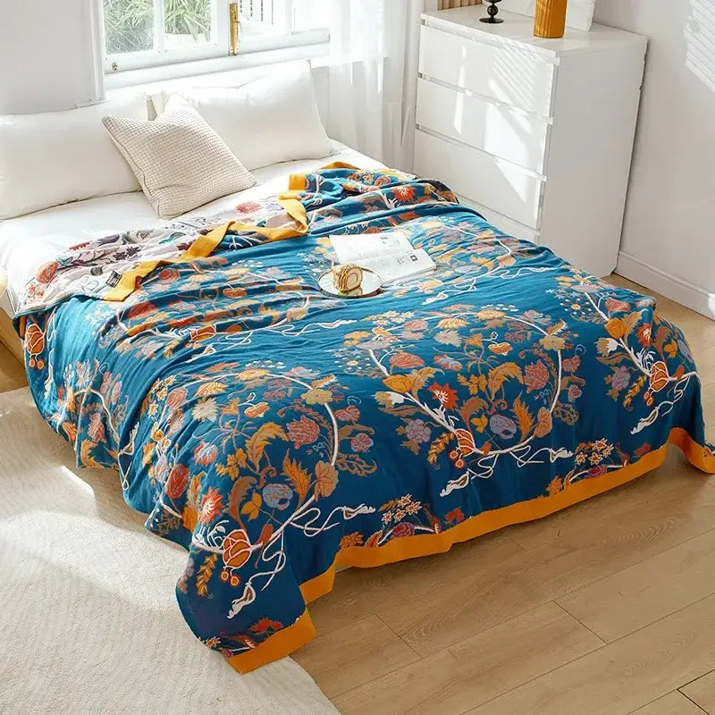 Vibrant blue boho mandala cotton summer blanket with floral patterns and mustard-yellow border for bedroom decor