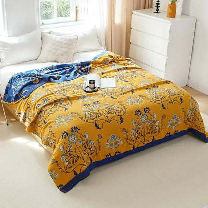 Vibrant yellow summer blanket with navy blue border and intricate botanical patterns by decorbites boho mandala cotton