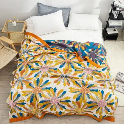 A decorbites boho mandala cotton summer blanket with vibrant floral pattern and orange border for bedroom throw