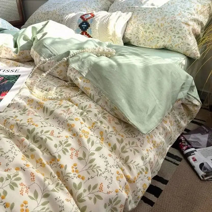 A soft mint green satin pillowcase with floral pattern on a matching quilted bedspread from decorbites boho pattern bedding set