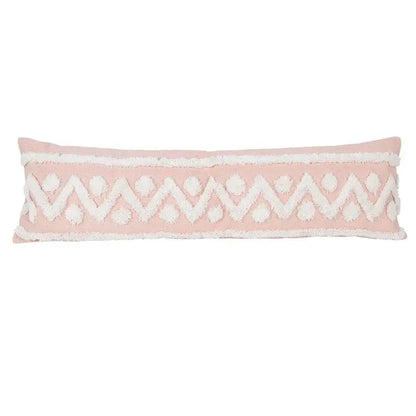A soft pink boho pink geometric pillow cover with white zigzag pattern and pom-pom accents for decorbites decor