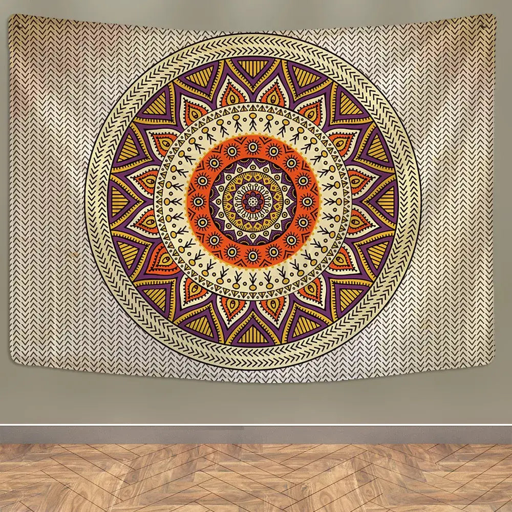 A vibrant boho rainbow indian mandala wall hanging tapestry with orange purple gold geometric patterns on beige fabric