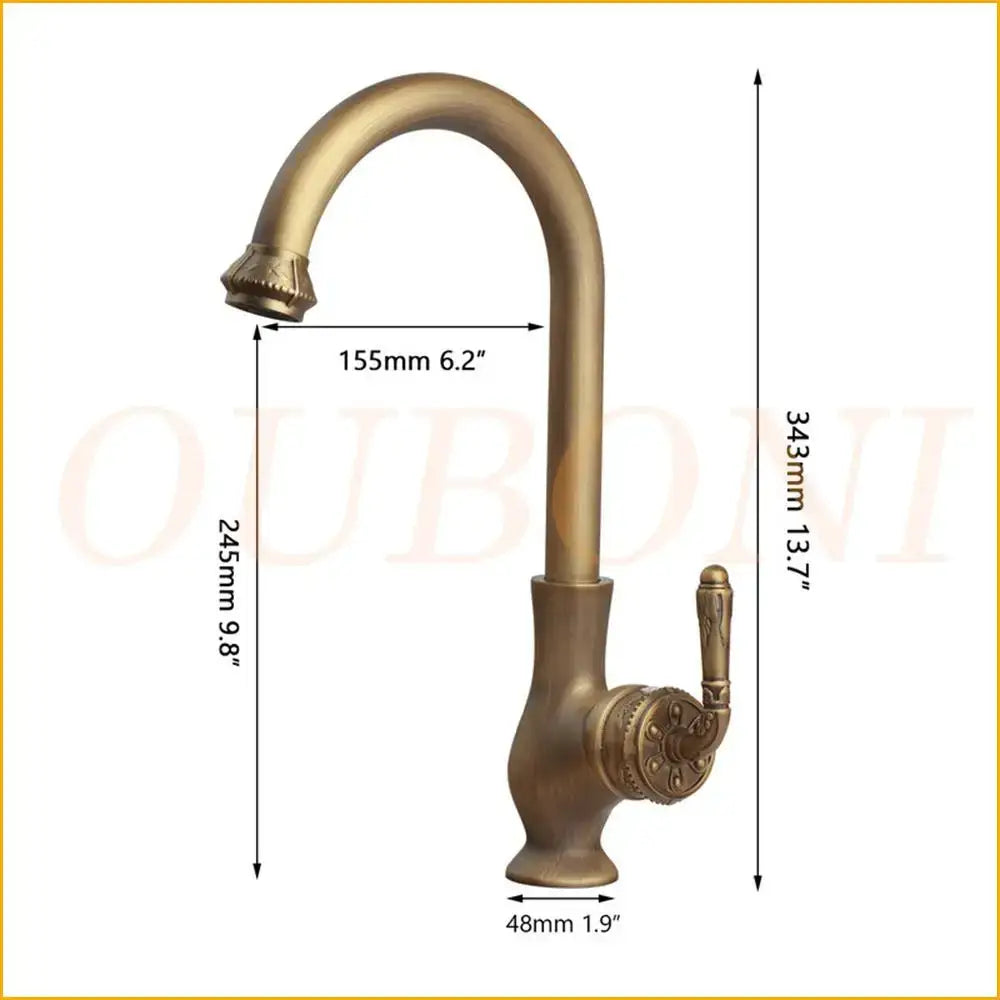 Antique brass-finished kitchen faucet with ornate detailing and curved spout paired with decorbites boho retro ceramic sink
