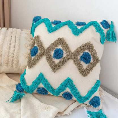Cream-colored decorbites boho square pillowcase with turquoise embroidery blue pom-poms and teal tassels for living room decor