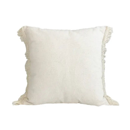 Cream-colored boho style cushion cover with soft linen fabric and delicate fringe tassels for decorbites boho style decor