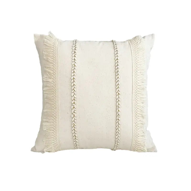 Cream-colored boho style linen cushion cover with textured braided cord and fringe tassels for living room decorbites decor