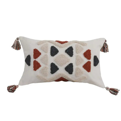 Cream pillow cover with textured rust and charcoal geometric pattern and multicolored tassels decorbites boho style embroidered