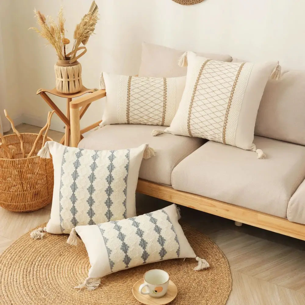 Cream-colored boho tassel cushion cover with blue geometric patterns and tassels for beige and gray living room decorbites decor
