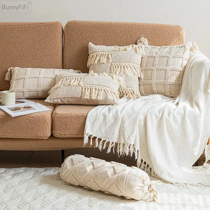 Cream-colored textured boho tassel cushion cover with woven diamond pattern and tassel trim for living room decorbites decor