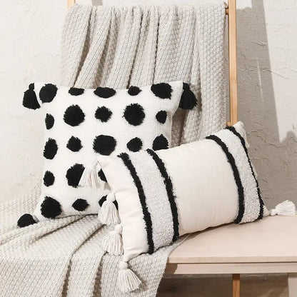 White pillow cover with black polka dots and tassels in decorbites boho tufted beige living room decor