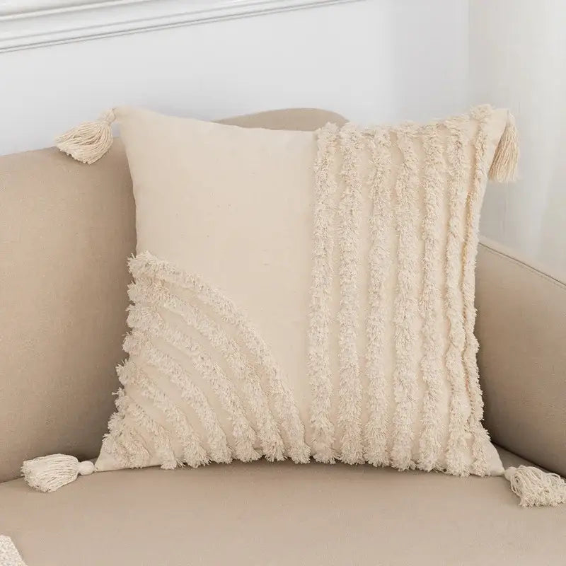 Cream-colored boho tufted beige throw pillow cover with textured fringed fabric and tassels for living room decorbites decor