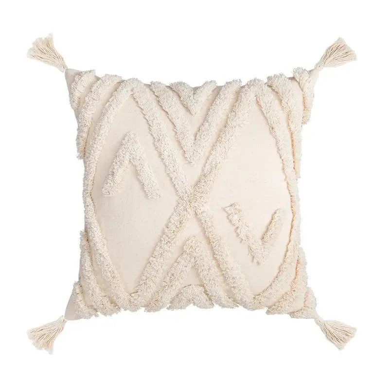 Cream-colored boho tufted embroidered cushion cover with textured fringed geometric patterns and tassels for living room decor