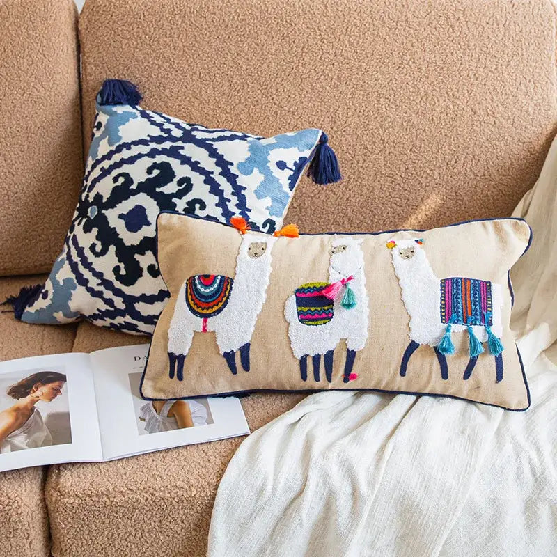 Beige rectangular boho vintage embroidered lumbar pillow case with three alpacas and colorful tassels for bedroom decor