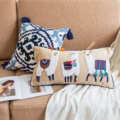 Beige rectangular boho vintage embroidered lumbar pillow case with three alpacas and colorful tassels for bedroom decor