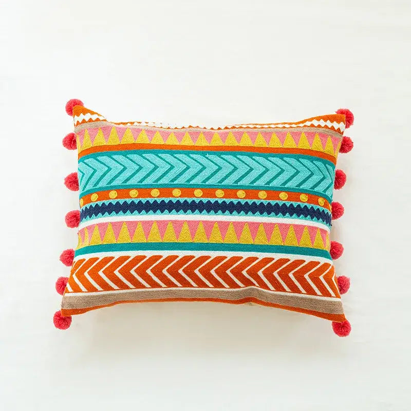 Boho vintage embroidered alpaca lumbar pillow case with vibrant geometric patterns and red pom-poms for decorbites decor