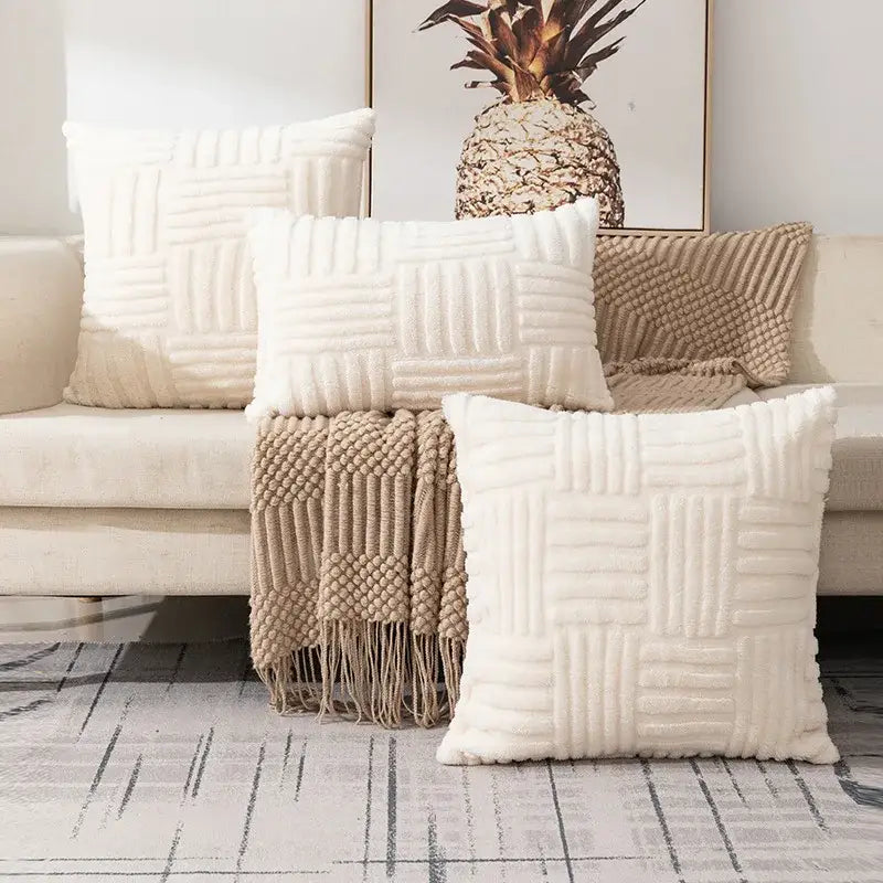 Cream-colored plush throw pillow covers with woven raised grid texture ideal for boho living room decor