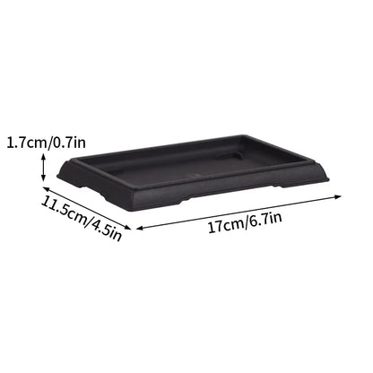 Black rectangular plastic plant pot tray with raised edges and shallow basin for bonsai or succulent plants para plantas