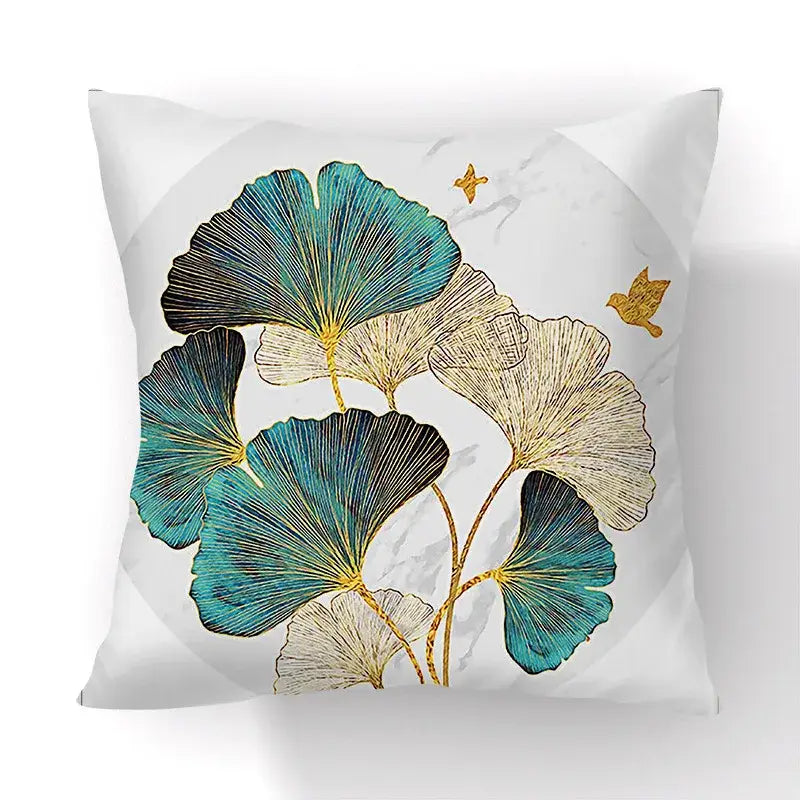 White throw pillow with teal and cream ginkgo leaves gold accents and small birds for living room cushion covers