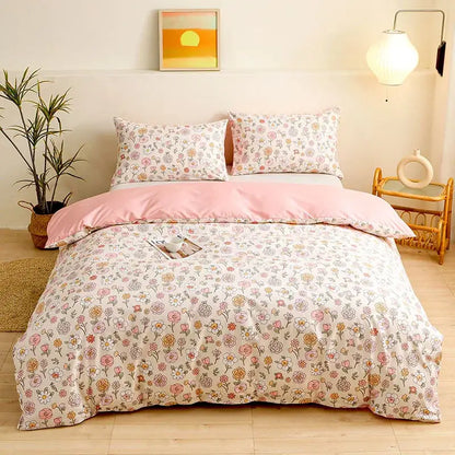 Botanical yellow and white floral duvet cover set with pastel floral comforter featuring cream base and delicate blossoms