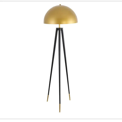 Brass and black coyote gold tripod floor lamp with gold dome shade and brass accents for living room decorbites coyote gold