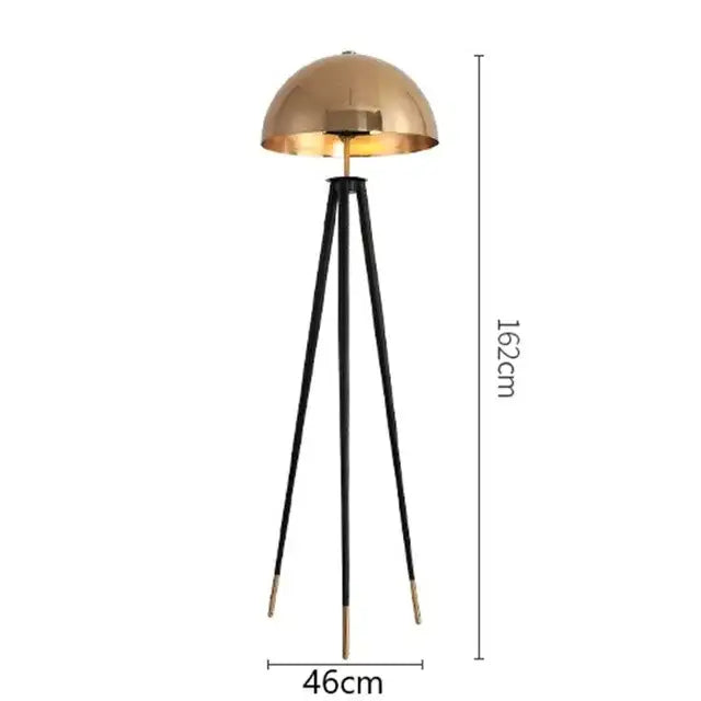 A sleek 162cm brass and black coyote gold tripod floor lamp with polished dome shade for living room decorbites coyote gold