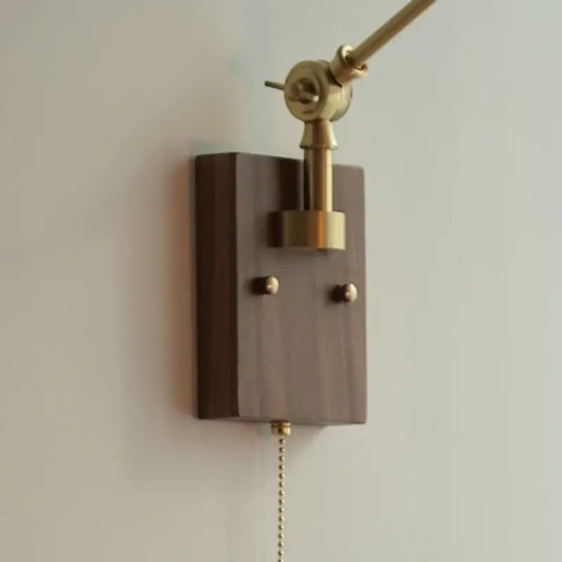 Brass and ribbed glass ceramic led wall light with brass finish and dark wood base featuring pull chain for bedroom sconce decorbites ceramic led wall