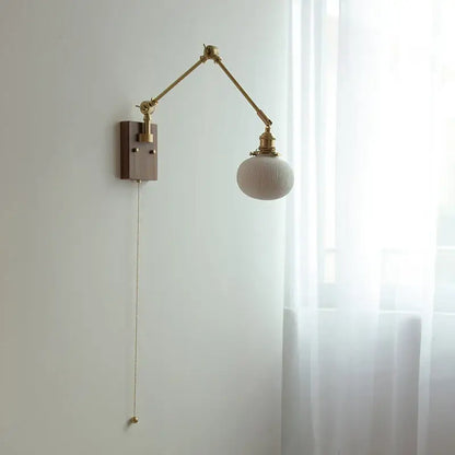 Brass adjustable wall light with ribbed off-white glass globe and wooden backplate decorbites ceramic led wall sconce
