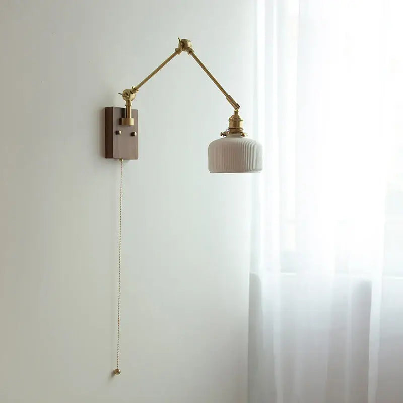 A vintage brass and ribbed glass ceramic led wall light with an adjustable arm for bedroom decorbites ceramic led wall use