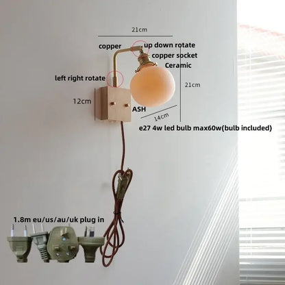 Brass and walnut ceramic led wall light with copper finish adjustable arm and ceramic globe shade for bedroom sconce decorbites ceramic led